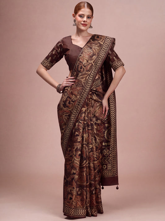 Woman wearing brown silk blend saree with traditional indian motif work and brown blouse