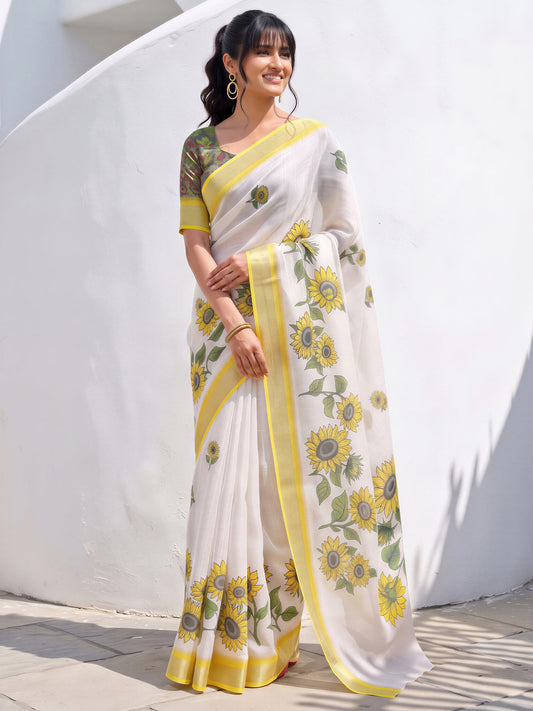 Woman wearing white cotton linen saree with all-over floral design and green blouse