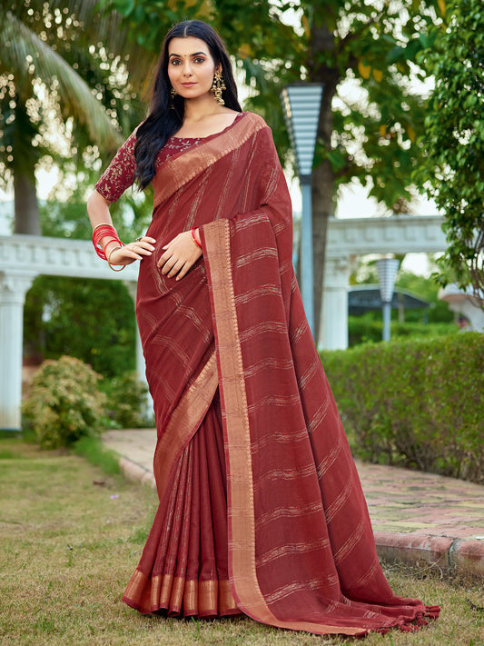 Woman wearing maroon georgette saree with striped pattern design and maroon blouse