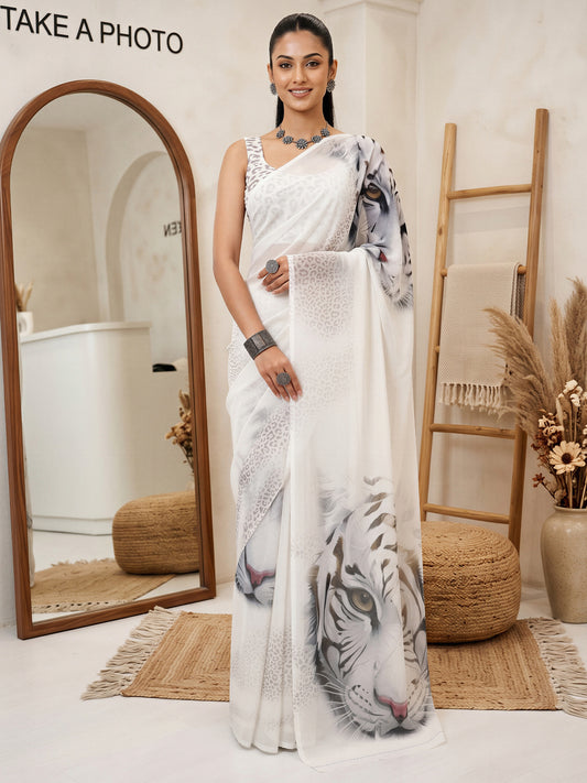 Woman wearing white organza saree with tiger motif design and white blouse