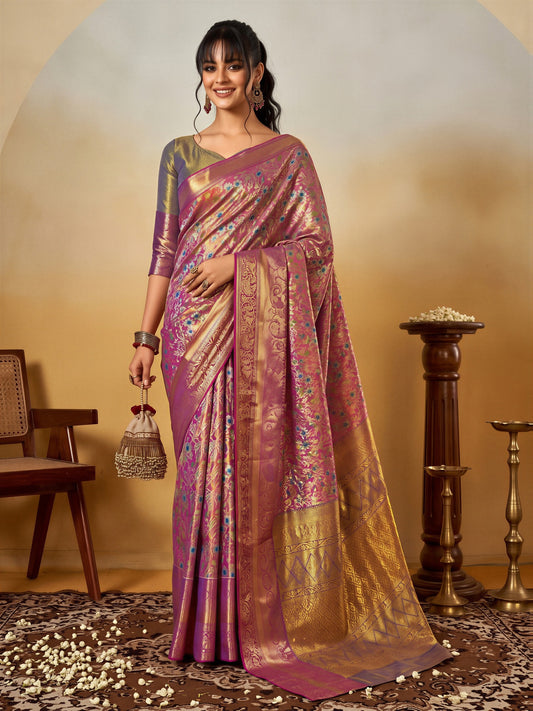 Woman wearing mauve silk blend saree with traditional indian motif work and silver blouse