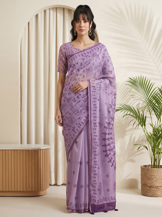 Woman wearing lavender cotton linen saree with warli folk-art figures and lavender blouse