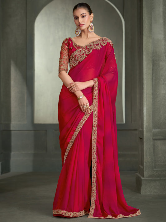 Woman wearing red chiffon saree with embroidered motif work and red blouse