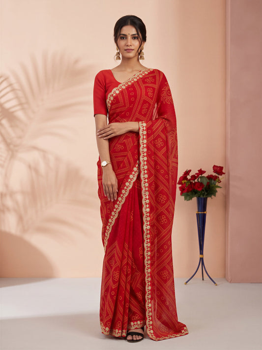 Woman wearing orange georgette saree with bandhani tie-dye dot work and orange blouse