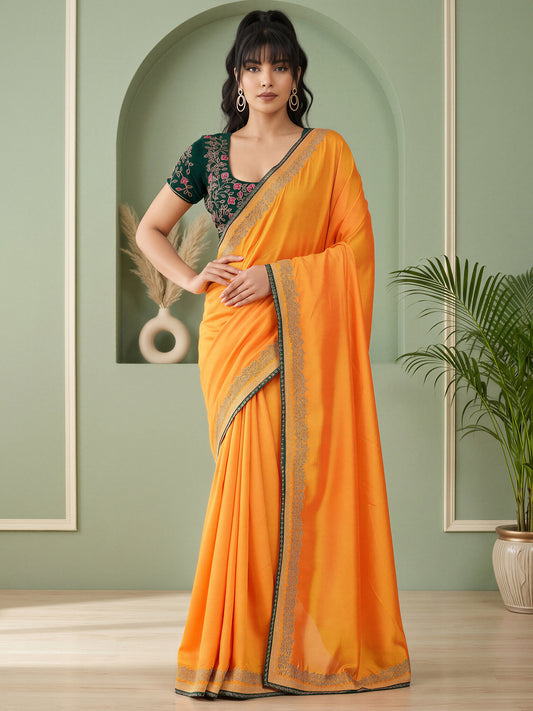 Woman wearing yellow vichitra silk saree with clean solid-tone finish and green blouse