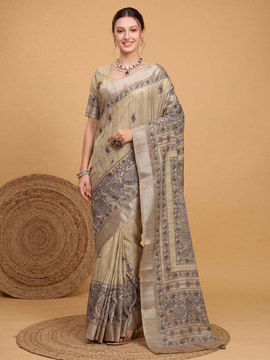 Woman wearing beige satin silk saree with kalamkari narrative motif work and beige blouse