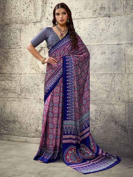 Woman wearing blue satin saree with ajrak block-print motif work and blue blouse