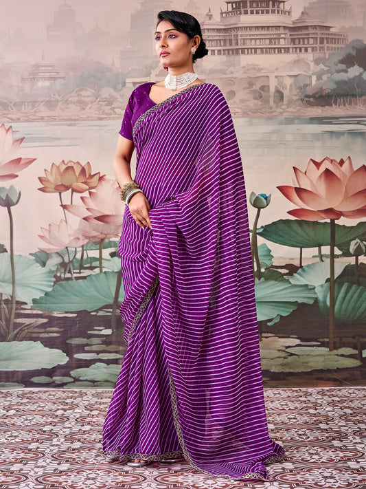 Woman wearing purple georgette saree with striped pattern design and purple blouse