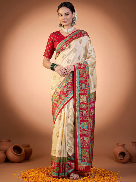 Woman wearing red silk blend saree with metallic foil print work and red blouse