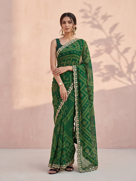 Woman wearing green georgette saree with bandhani tie-dye dot work and green blouse