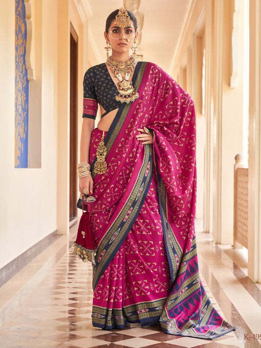 Pink ikat silk blend saree with navy blue blouse piece