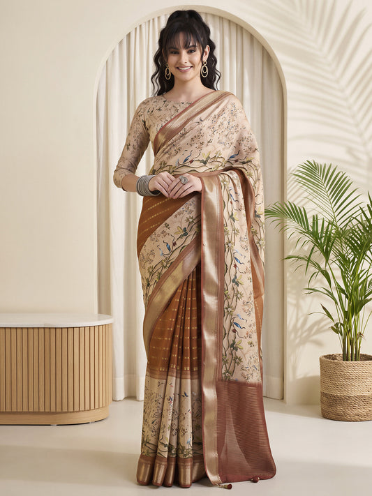 Woman wearing rust viscose silk saree with botanical floral and leaf design and beige blouse