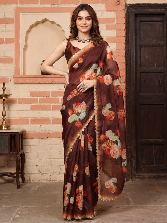 Woman wearing brown organza saree with all-over floral design and brown blouse