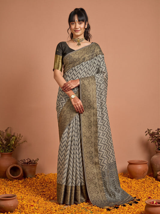 Woman wearing black viscose saree with geometric pattern design and black blouse