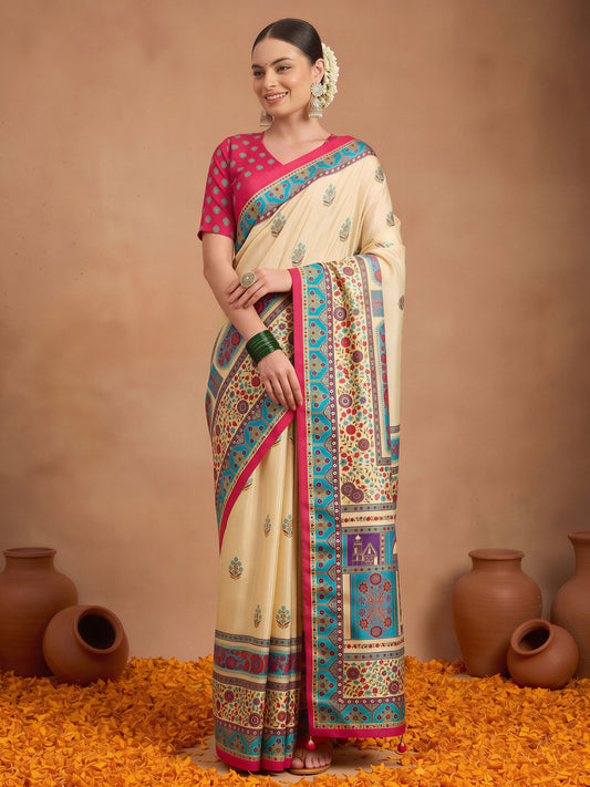 Woman wearing cream silk blend saree with metallic foil print work and pink blouse