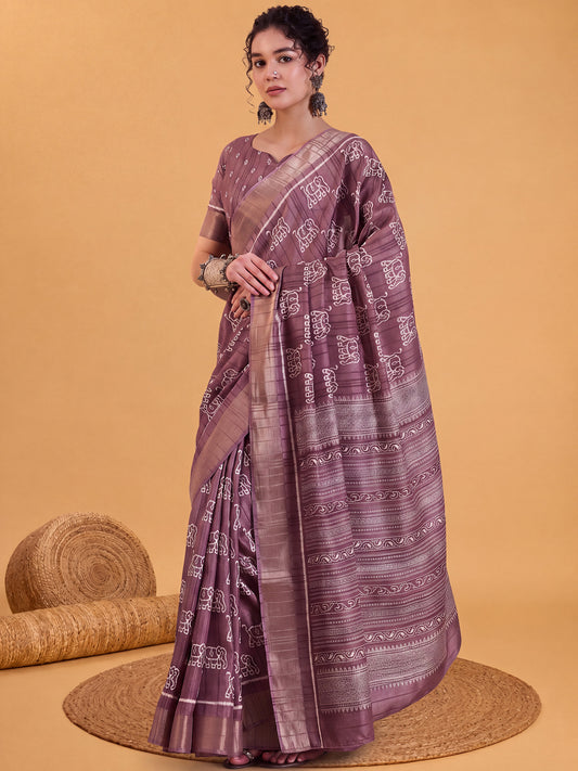 Woman wearing mauve silk blend saree with hand block-printed motifs and mauve blouse
