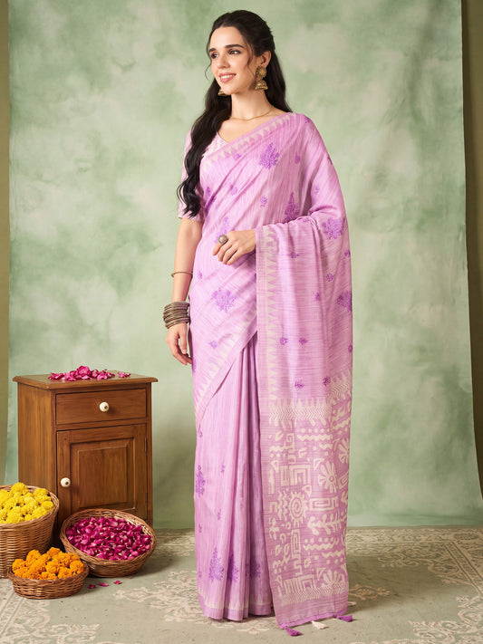 Woman wearing lavender silk blend saree with embroidered motif work and lavender blouse