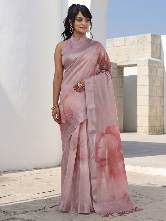 Woman wearing mauve cotton silk saree with all-over floral design and mauve blouse