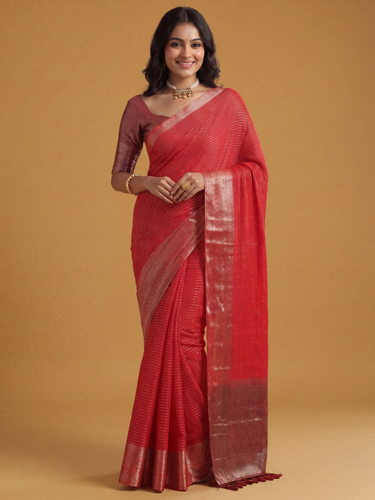 Woman wearing red chiffon saree with striped pattern design and maroon blouse