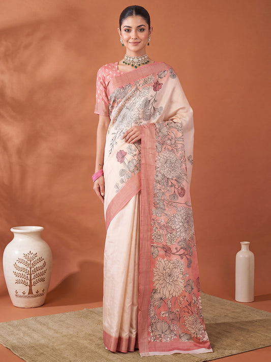 Woman wearing off white satin silk saree with all-over floral design and peach blouse