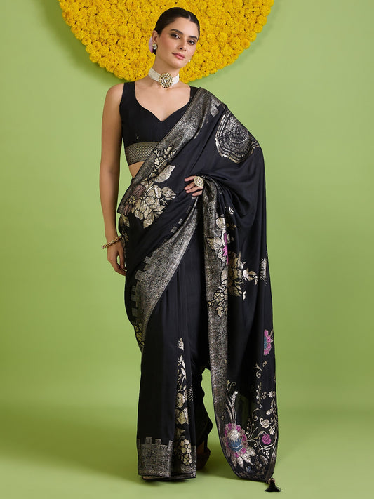Woman wearing black silk blend saree with all-over floral design and black blouse