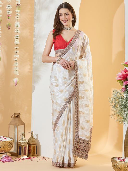 Woman wearing white viscose silk saree with zari butta (metallic motif) work and red blouse