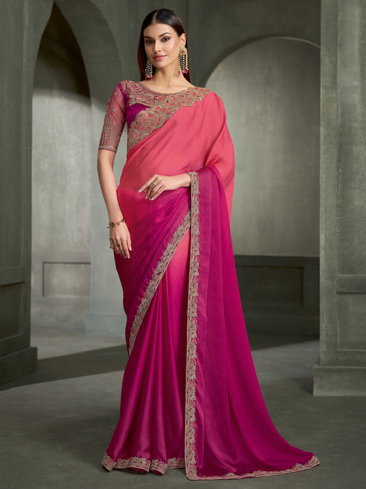 Woman wearing pink chiffon saree with embroidered motif work and magenta blouse