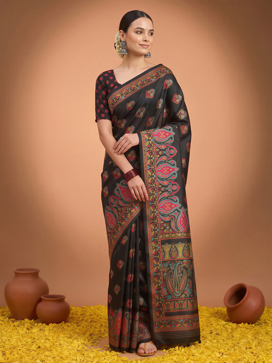 Woman wearing black silk blend saree with metallic foil print work and black blouse
