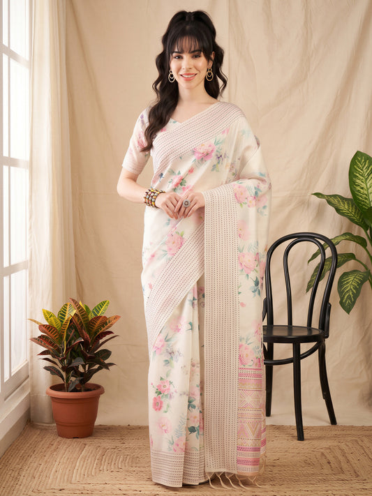 Woman wearing off white silk cotton saree with botanical floral and leaf design and off white blouse