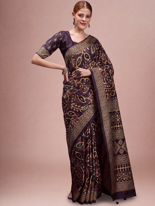 Woman wearing dark brown silk blend saree with traditional indian motif work and dark brown blouse