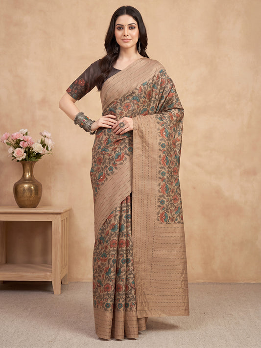 Woman wearing beige silk blend saree with kalamkari narrative motif work and charcoal grey blouse