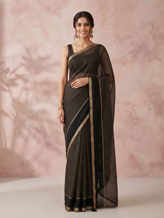 Woman wearing black viscose saree with checked pattern design and black blouse