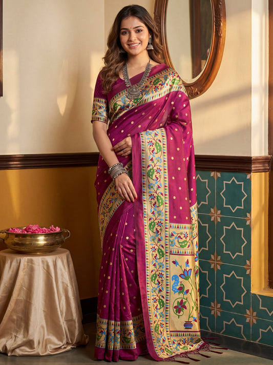 Woman wearing wine silk blend saree with zari butta (metallic motif) work and wine blouse