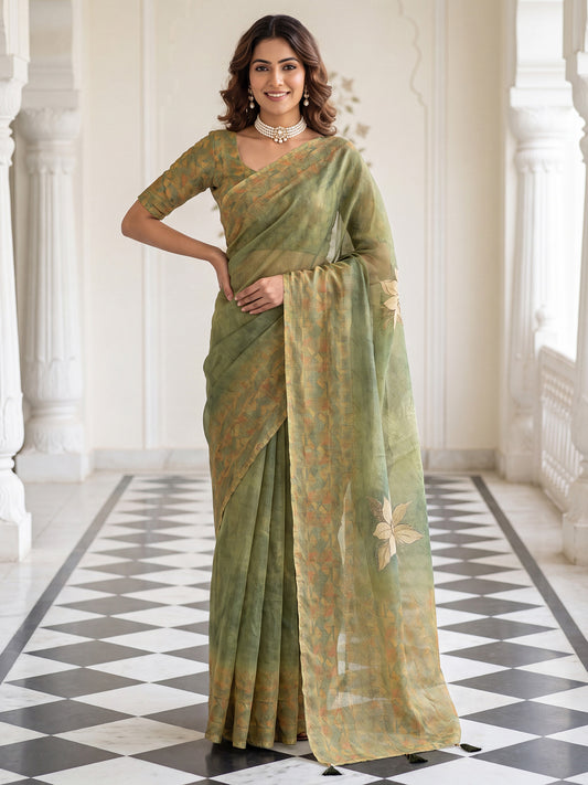 Woman wearing olive cotton silk saree with traditional indian motif work and olive blouse