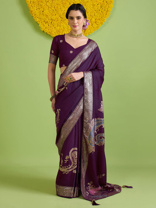 Woman wearing wine silk blend saree with zari butta (metallic motif) work and wine blouse