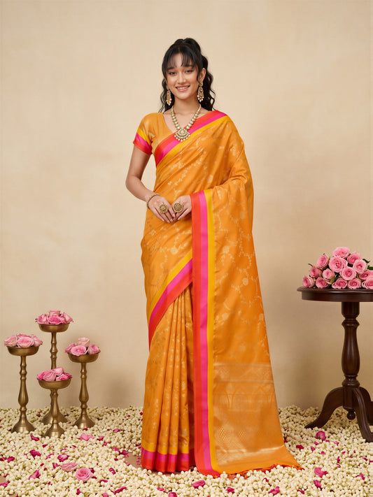 Woman wearing orange pure silk saree with traditional indian motif work and orange blouse