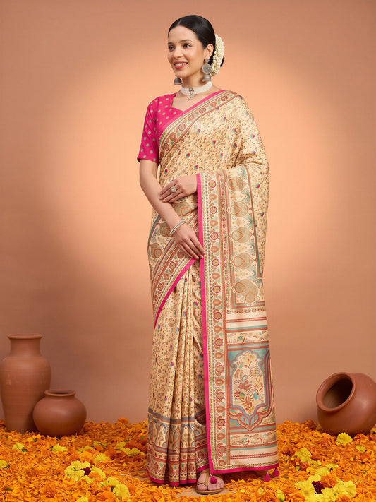 Woman wearing cream silk blend saree with metallic foil print work and pink blouse
