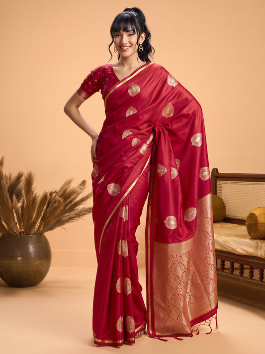 Woman wearing red satin silk saree with zari butta (metallic motif) work and red blouse