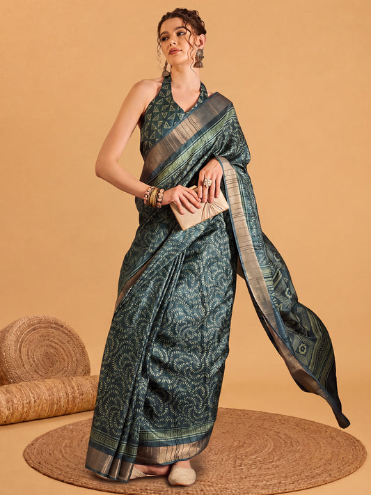 Woman wearing teal green silk blend saree with bagru hand block-print work and teal green blouse