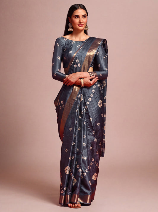 Woman wearing grey silk blend saree with traditional indian motif work and grey blouse
