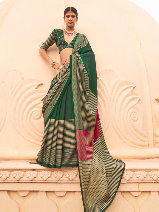 Woman wearing green silk blend saree with striped pattern design and green blouse