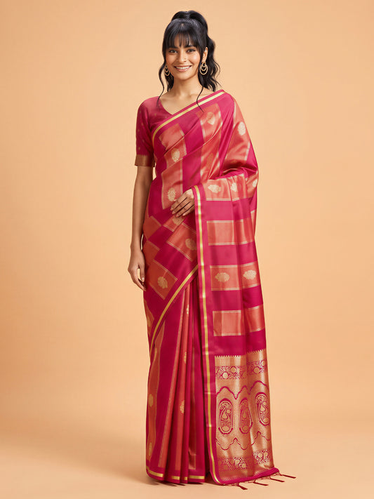 Woman wearing red satin saree with traditional indian motif work and red blouse