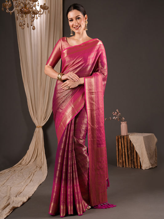 Woman wearing wine viscose silk saree with striped pattern design and pink blouse