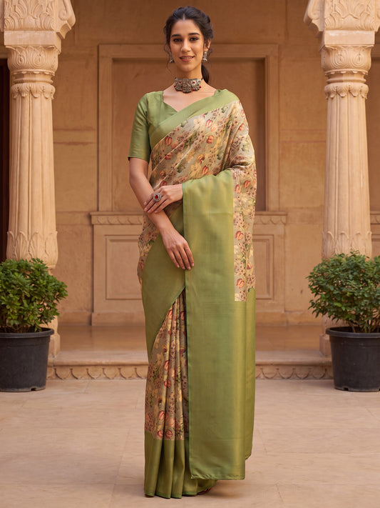 Woman wearing green silk blend saree with all-over floral design and green blouse