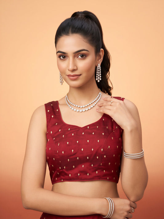 Maroon sequin embellished silk blend sleeveless readymade saree blouse with round neck