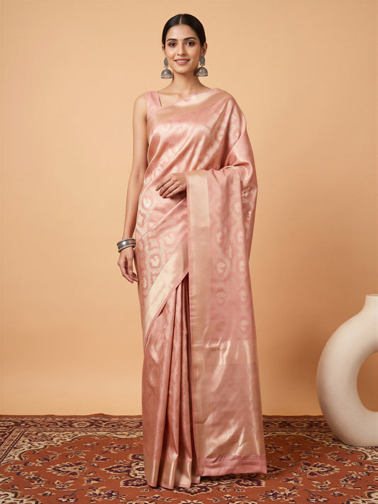 Woman wearing peach silk blend saree with woven motif design and peach blouse