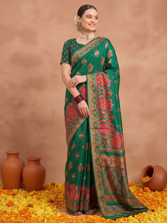 Woman wearing green silk blend saree with metallic foil print work and green blouse