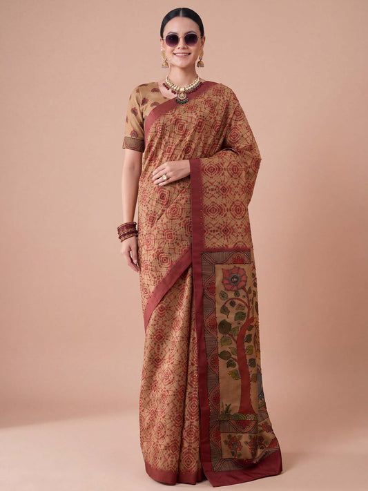 Woman wearing beige silk blend saree with madhubani folk-art motifs and beige blouse
