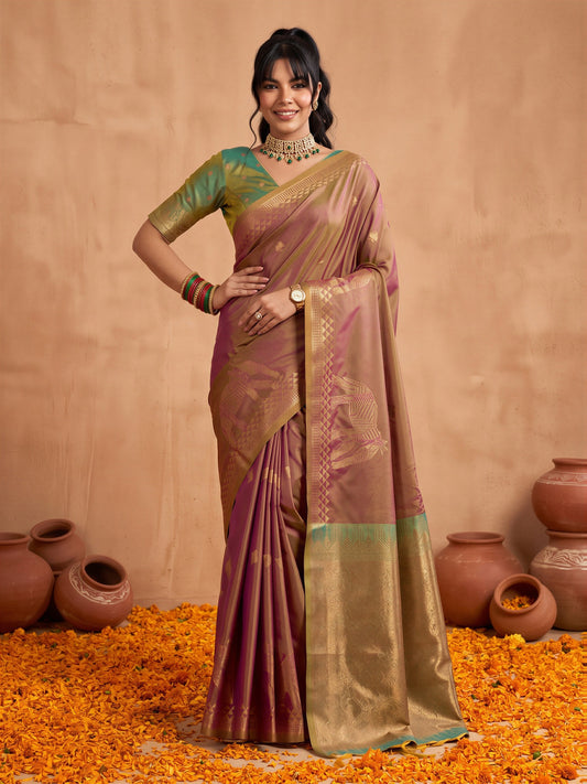 Woman wearing brown silk saree with animal-print design and light green blouse