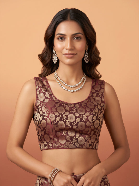Maroon woven brocade silk blend sleeveless readymade saree blouse with round neck